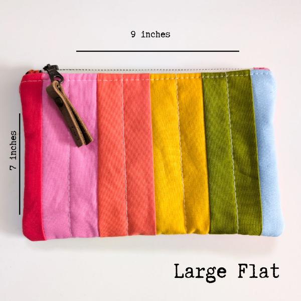 Handmade fabric pouches, Handmade pouches, Fabric pouches, Hand-sewn pouches, Custom fabric pouches, Eco-friendly pouches, Zipper fabric pouches, Quilted fabric pouches, Handcrafted fabric bags, Reusable fabric pouches, Small fabric pouches, Travel fabric pouches, Fabric pouches for storage, Rifle Paper Co. pouches,Ruby Star Society pouches, Bloom handmade fabric pouches, The Standard handmade pouches, rainbow pouches