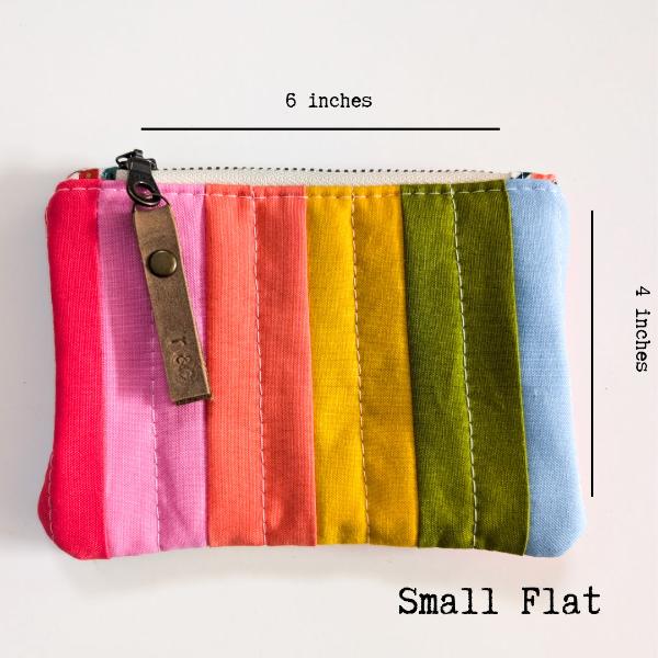 Handmade fabric pouches, Handmade pouches, Fabric pouches, Hand-sewn pouches, Custom fabric pouches, Eco-friendly pouches, Zipper fabric pouches, Quilted fabric pouches, Handcrafted fabric bags, Reusable fabric pouches, Small fabric pouches, Travel fabric pouches, Fabric pouches for storage, Rifle Paper Co. pouches,Ruby Star Society pouches, Bloom handmade fabric pouches, The Standard handmade pouches, rainbow pouches
